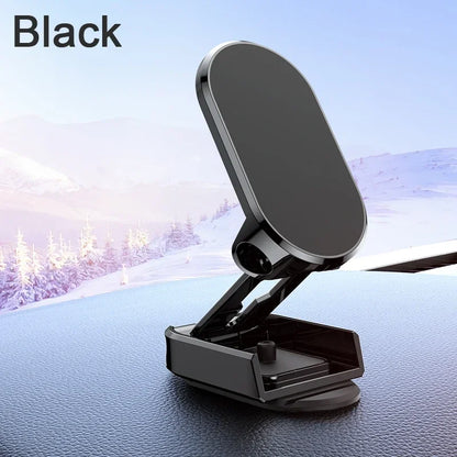 Black car phone holder on a car dashboard with a snowy landscape in the background