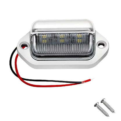 Car license plate light with wiring and screws on a white background