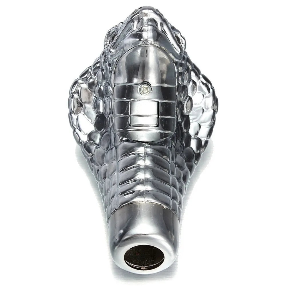 Chrome car emblem in the shape of a snake head on a white background