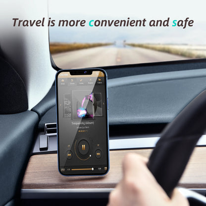 Phone mounted on a car dashboard with a music app displayed, showing a road outside.