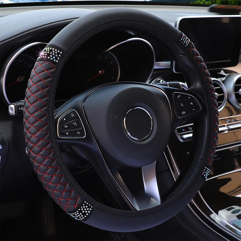 Steering wheel black cover red in a car interior