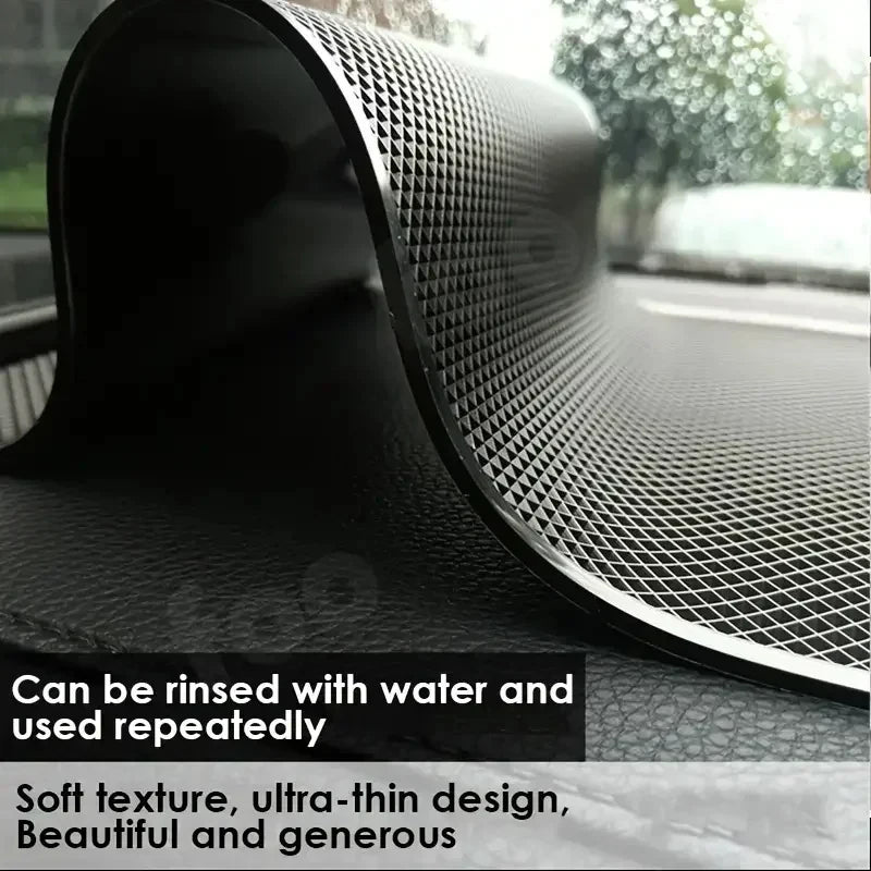 Textured black mat with water-resistant properties on a blurred outdoor background