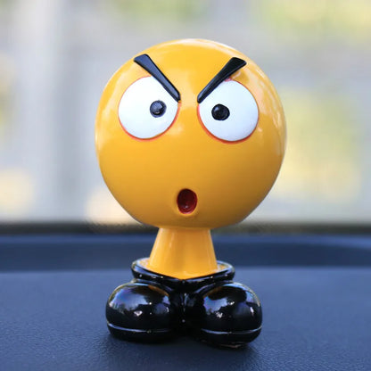 Yellow character figurine with an angry expression on a blurred background